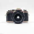 Nikon FM10 + Nikkor 35–70mm f/3.5-4.8 | SLR Film Camera + Lens | Good