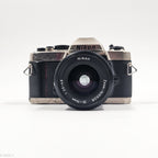 Nikon FM10 + Nikkor 35–70mm f/3.5-4.8 | SLR Film Camera + Lens | Good