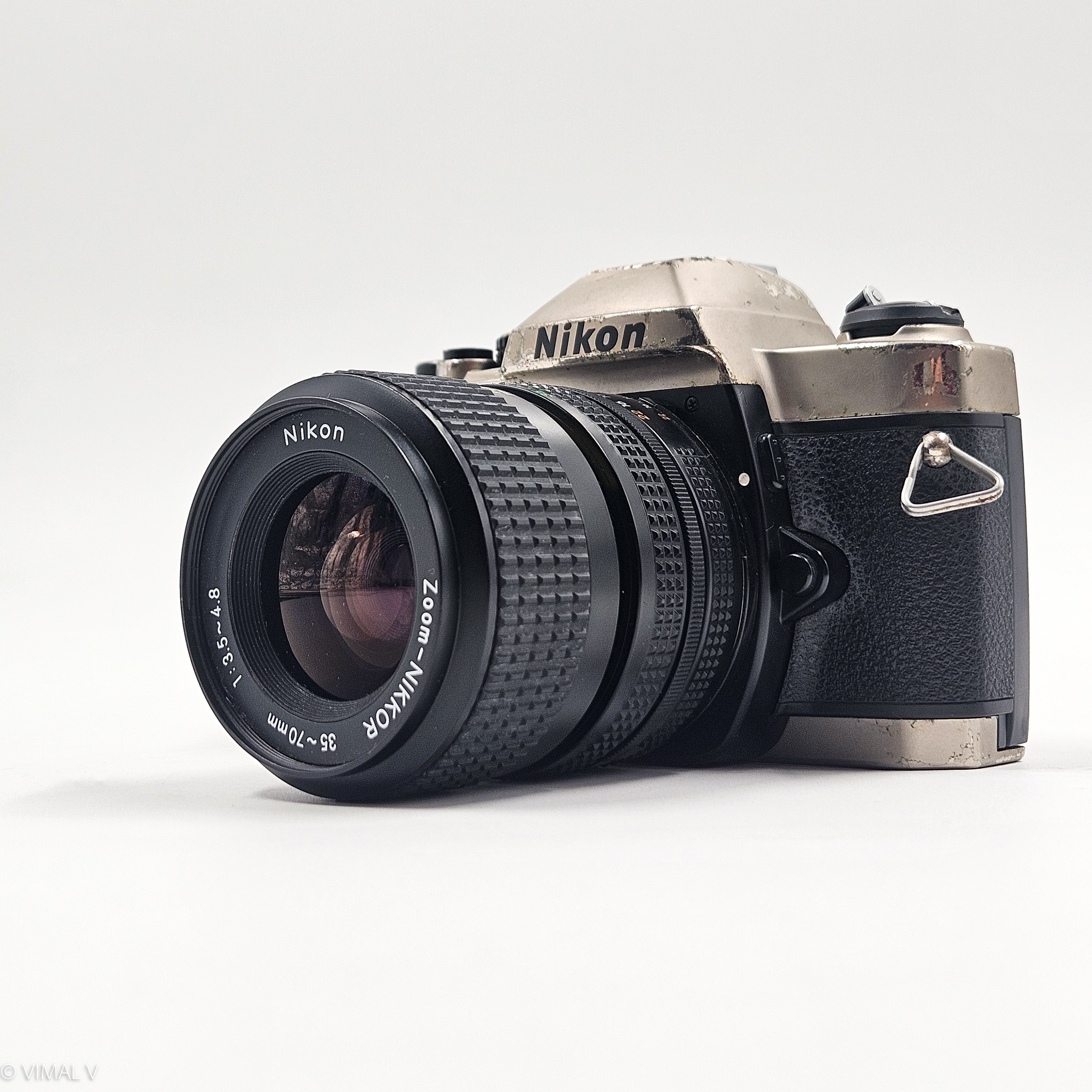 Nikon FM10 + Nikkor 35–70mm f/3.5-4.8 | SLR Film Camera + Lens | Good