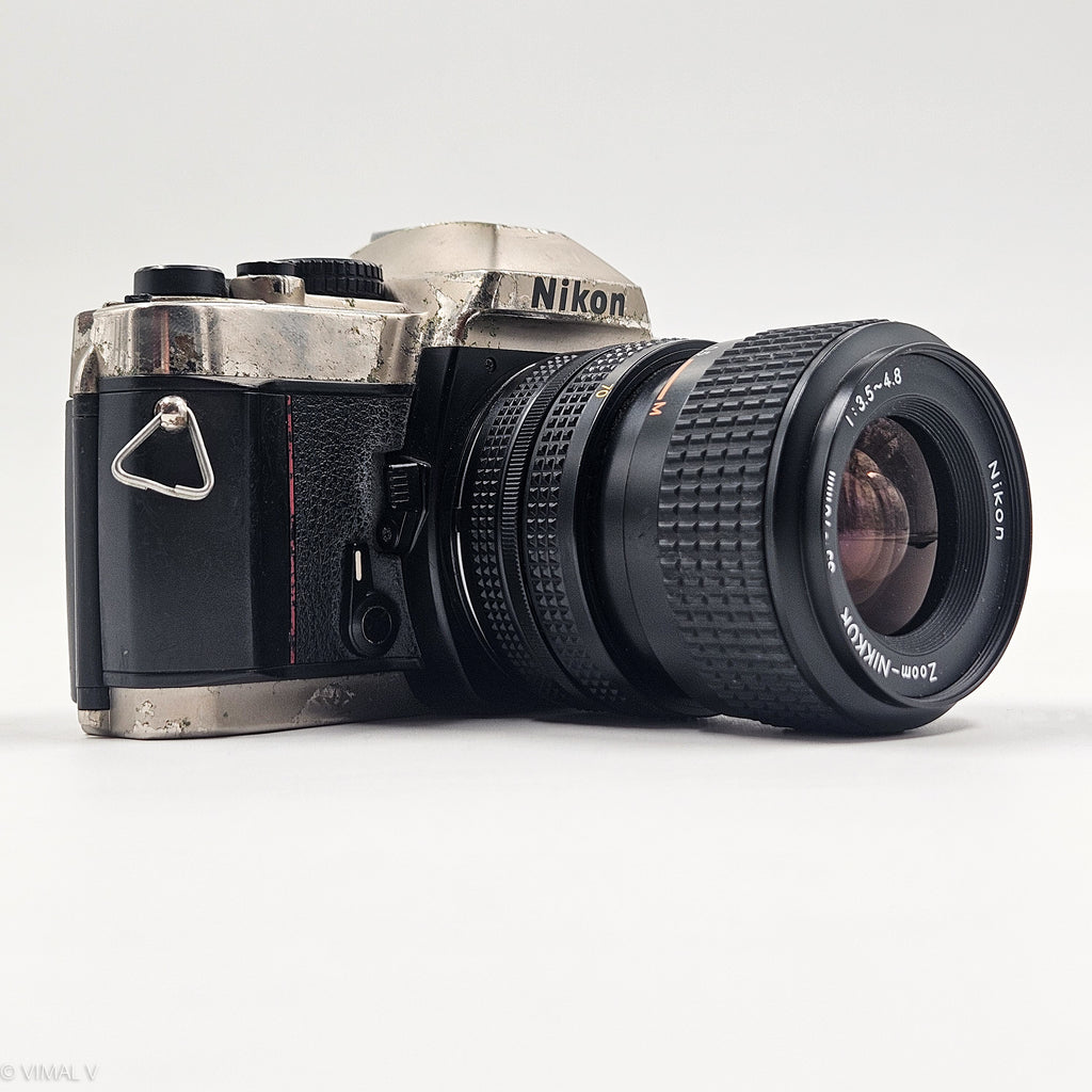 Nikon FM10 + Nikkor 35–70mm f/3.5-4.8 | SLR Film Camera + Lens | Good