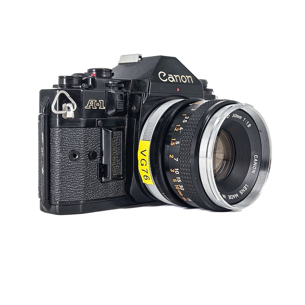 Canon A-1 + Canon FD 50mm f/1.8 | SLR Film Camera + Lens | Excellent