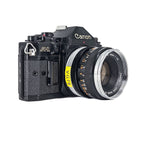 Canon A-1 + Canon FD 50mm f/1.8 | SLR Film Camera + Lens | Excellent