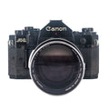 Canon A-1 + Canon FL 135mm f/2.5 | SLR Film Camera + Lens | Good