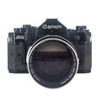 Canon A-1 + Canon FL 135mm f/2.5 | SLR Film Camera + Lens | Good