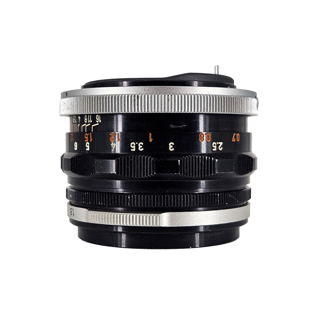 Canon FX + Canon FL 50mm f/1.8 | SLR Film Camera + Lens | Good